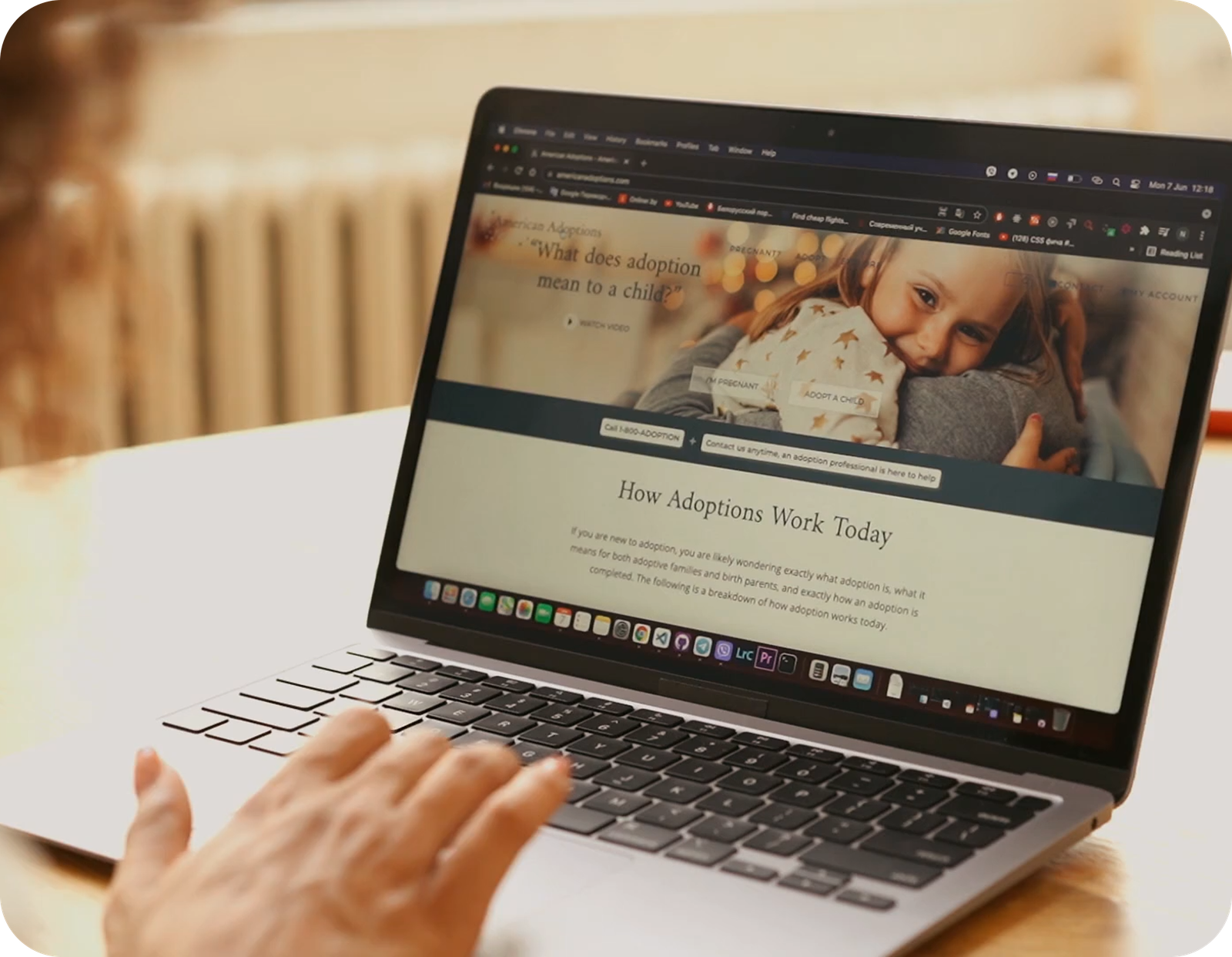 A website displayed on a laptop.